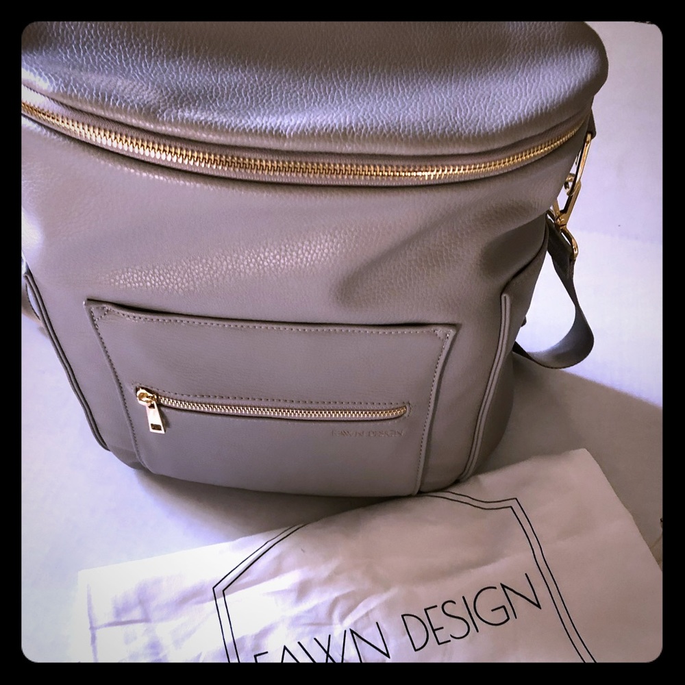 Back pack diaper bag, brand new, gray color.